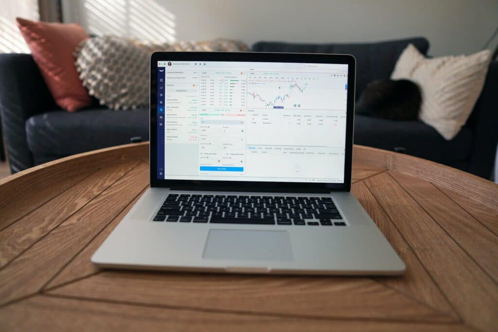 Laptop screen with trading charts