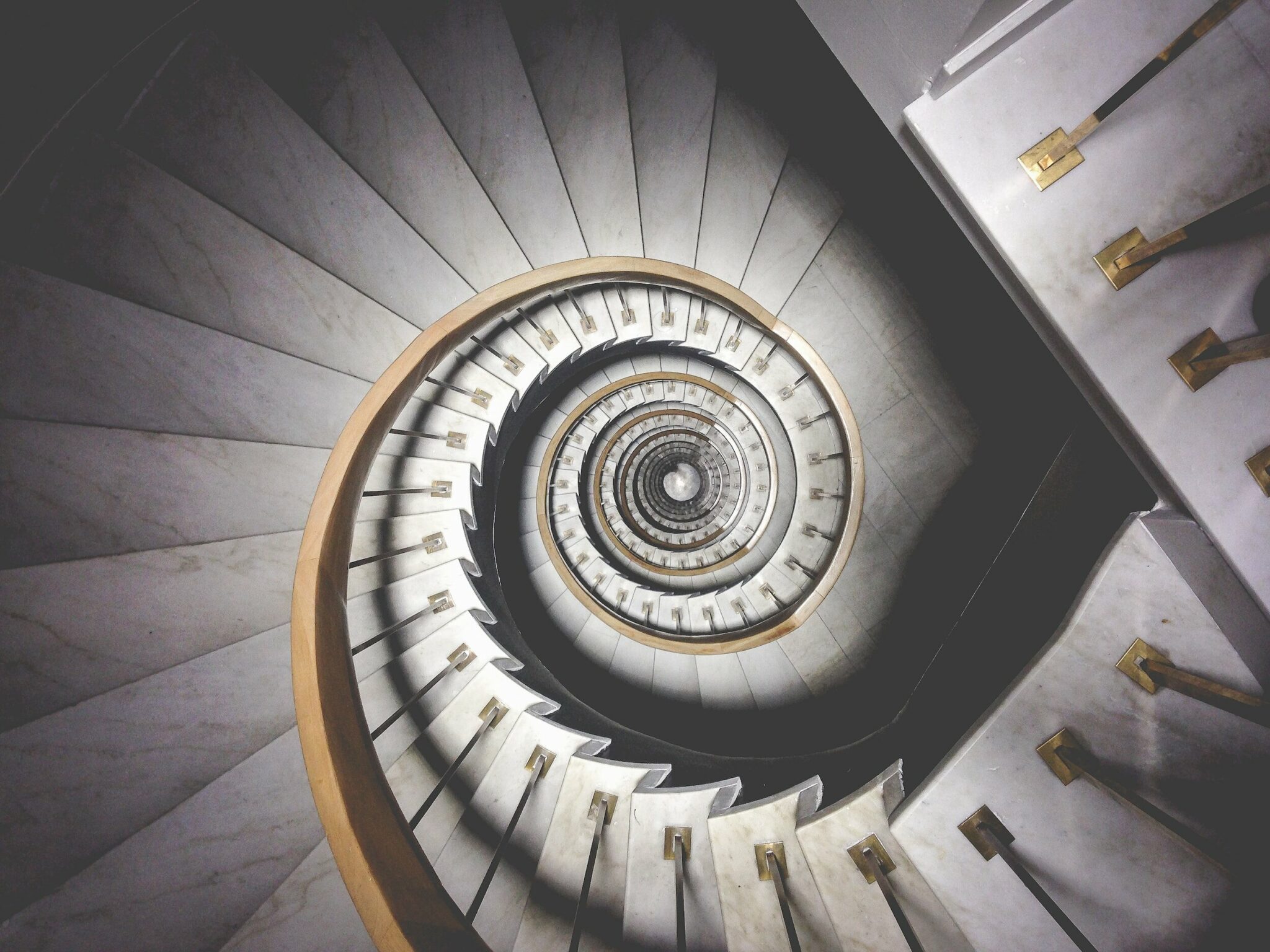 Looking down a spiral staircase