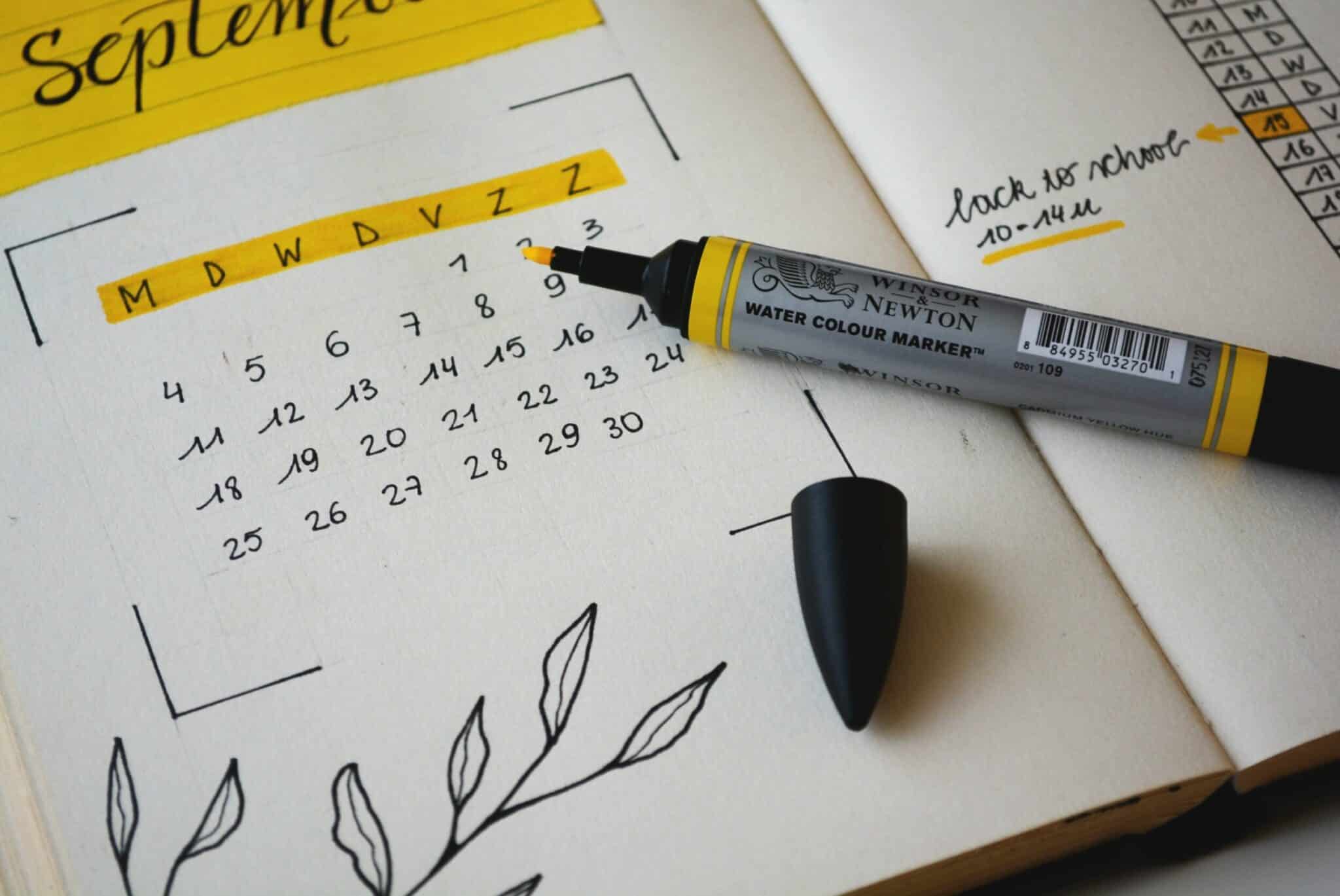 Marker pen crossing off days on calendar