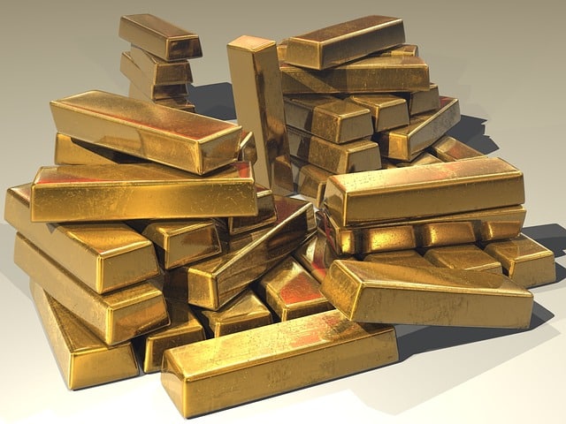 Gold bullion bars piled high