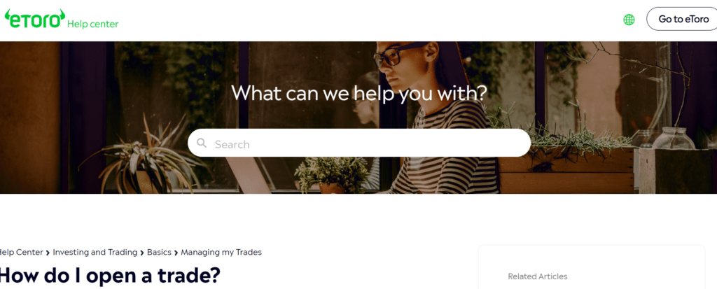 eToro Help Center page with a search bar, illustrating how to get support for opening trades.