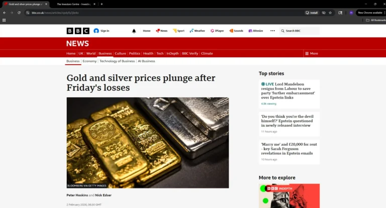 Gold and silver bars photographed after a news report highlighting a sharp drop in precious metal prices.