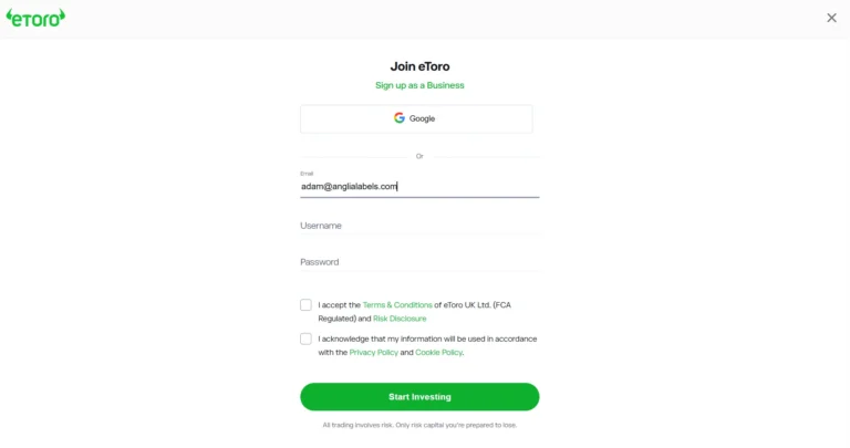 eToro UK account registration page showing email entry field, username and password fields, and green “Start Investing” button.